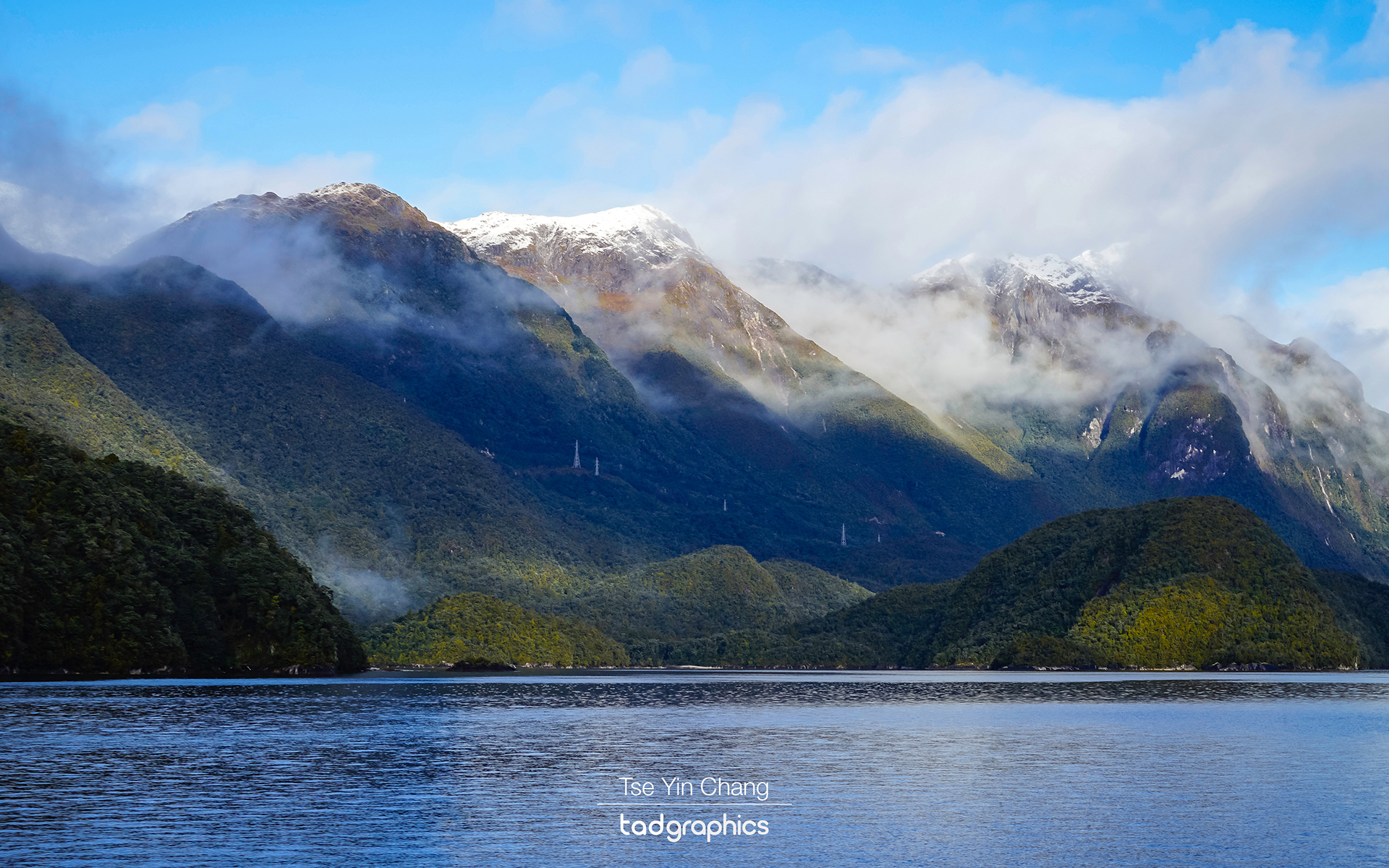 Majestic fjords are visible while sailing across Lake Manapouri