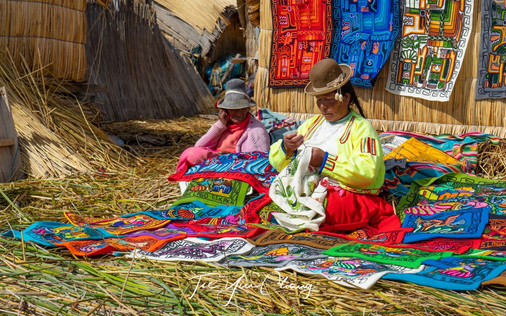 Self-sufficient Uros people weave and sell their handicrafts