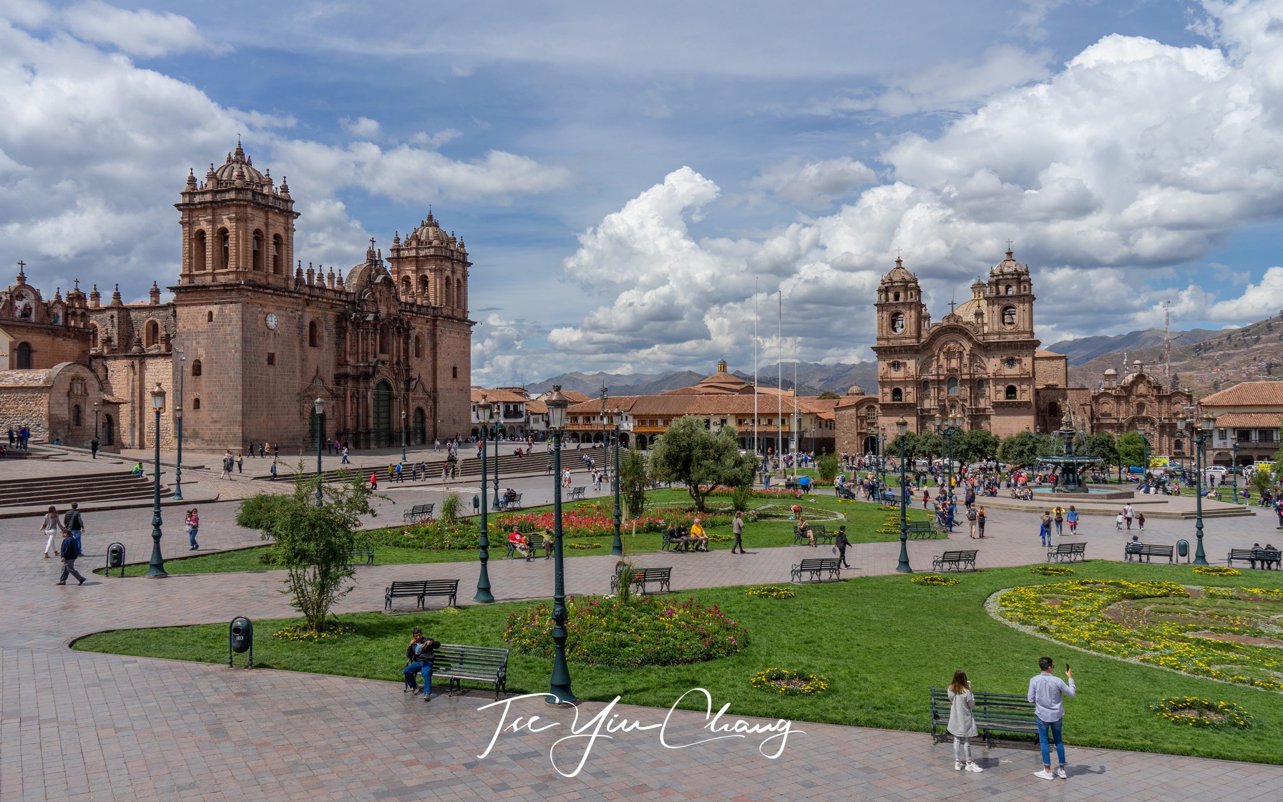 Cusco's old city, the grand square of Plaza de Armas has been landscaped with grass, flowerbeds and fountains making it a pleasant place to sit and watch the locals pass. On the left is Cusco Cathedral and on the right is the Church of the Society of Jesus