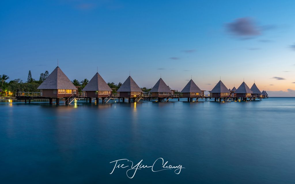 Overwater bungalow at Îlot Maître feature an undisturbed view of the lagoon with the natural reserve in the background